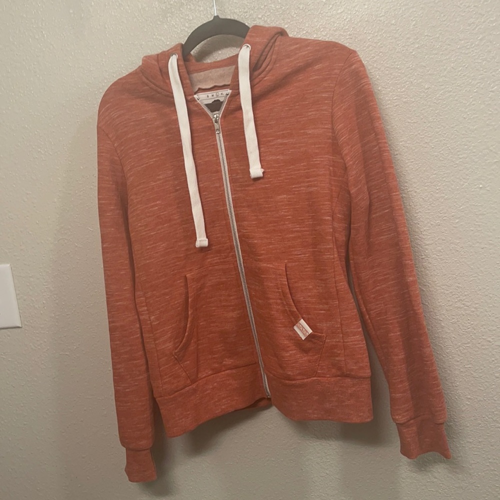 Orange zip up jacket